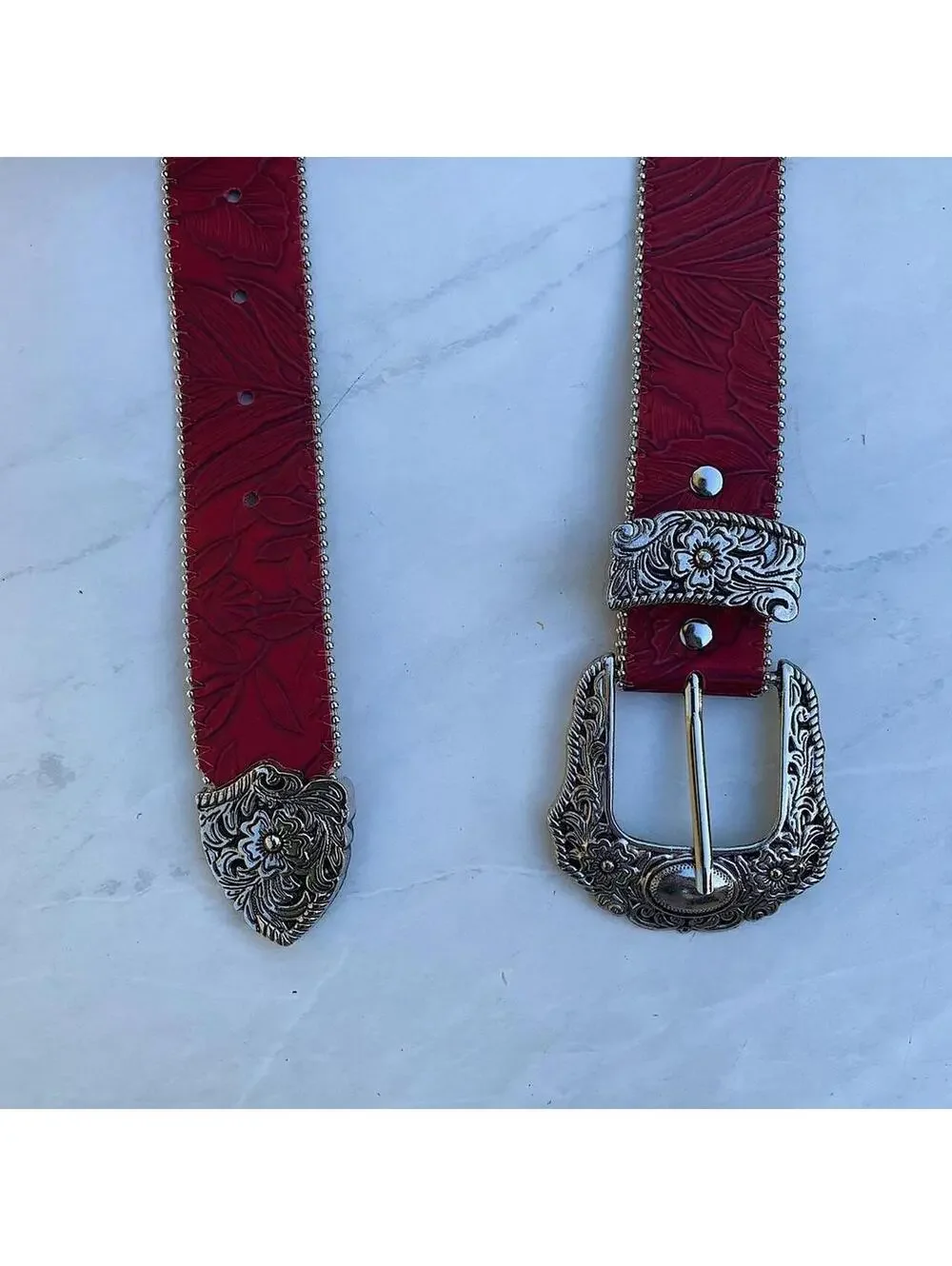 Red Western Floral belt with silver belt buckle. 38 inches length